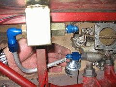 Fuel pump moved above the motor mount rail to make room for exhaust downpipe. IMG_0418a.jpg